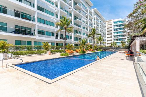 an image of a swimming pool in front of a building at Morros 3 in Cartagena de Indias