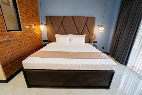 Postel nebo postele na pokoji v ubytování Limeshine - Airport Transit Hotels & Residences