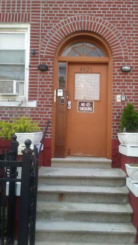 a door with a no smoking sign on it at Furman Apartments in Wakefield