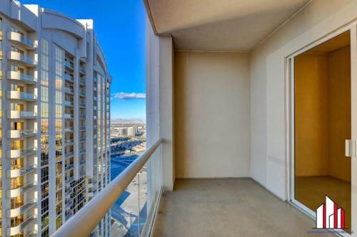 a balcony with a view of a building at MGM Signature-33-711 F1 Track & Strip View Balcony in Las Vegas
