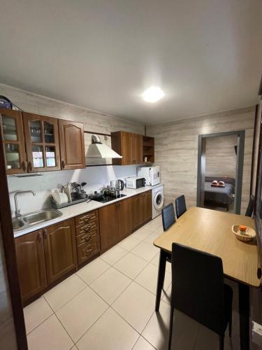 Kuchyň nebo kuchyňský kout v ubytování Hotel Voyage Вояж