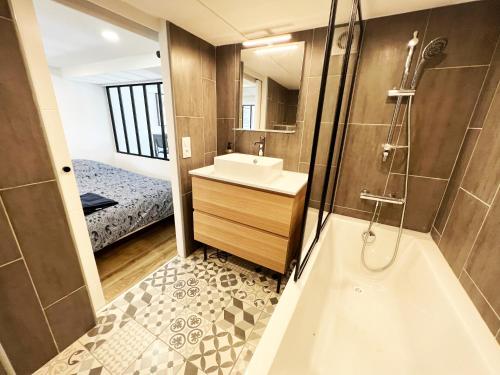 Un baño de 2 pièces cosy à 15 min de Paris