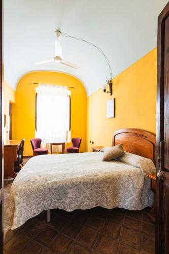 Postel nebo postele na pokoji v ubytování Hotel Balneario De Sierra Alhamilla