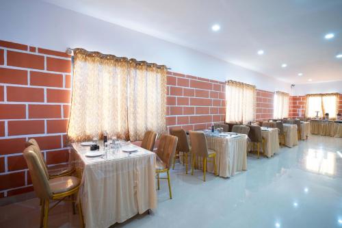 Posezení v ubytování Treebo Galaxy Kings Suites, Hebbal