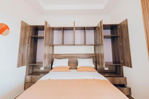 Ένα ή περισσότερα κρεβάτια σε δωμάτιο στο ROOFTOP VIEW APARTMENTS REBERO
