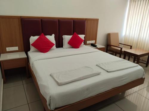 Llit o llits en una habitació de Hotel Janardana