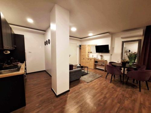 Arcobaleno Apartments & Roomsにあるテレビまたはエンターテインメントセンター