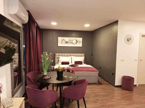 Arcobaleno Apartments & Roomsにあるベッド