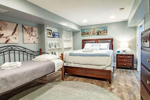 a bedroom with two beds and a rug at Delightful 1-BR Accommodations Nearby METRO in Washington, D.C.