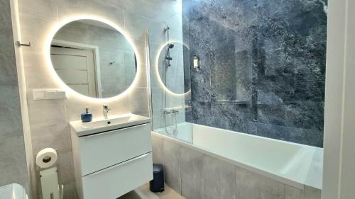 Kúpeľňa v ubytovaní NOOK NOOK Apartments Bytkowska 103