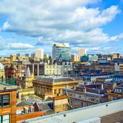 a view of a city skyline with buildings at Glasgow Green Getaway with Free Parking in Glasgow