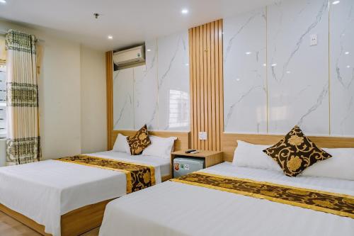 Postel nebo postele na pokoji v ubytování Văn Phượng 2
