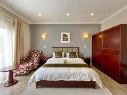 Ένα ή περισσότερα κρεβάτια σε δωμάτιο στο Atlantic Pearl Guest House Rivonia