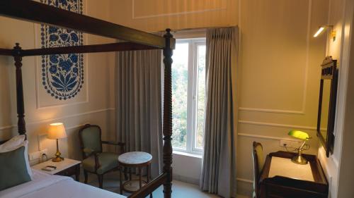 Ένα ή περισσότερα κρεβάτια σε δωμάτιο στο Hotel Naren Villa