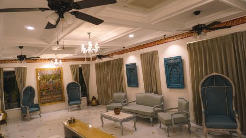 Χώρος καθιστικού στο Hotel Naren Villa