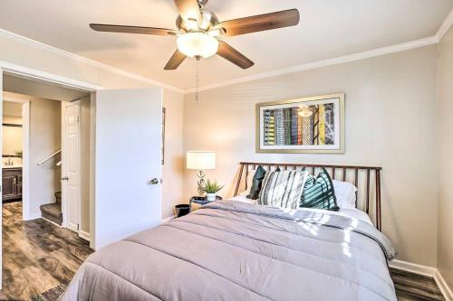 a bedroom with a bed with a ceiling fan at Southern Charm l 5BR l Sleeps 14 l A Location in Birmingham