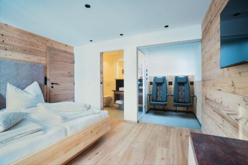 Postel nebo postele na pokoji v ubytování das Luggi Appartements