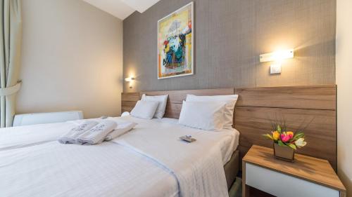 Hotel Monsにあるベッド