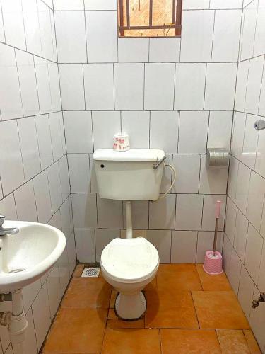 Vonios kambarys apgyvendinimo įstaigoje Petite paradise