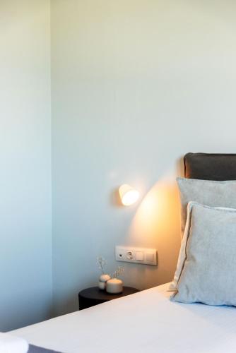 Postel nebo postele na pokoji v ubytování Serenite Maison