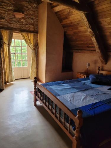 Postel nebo postele na pokoji v ubytování Gite Forge