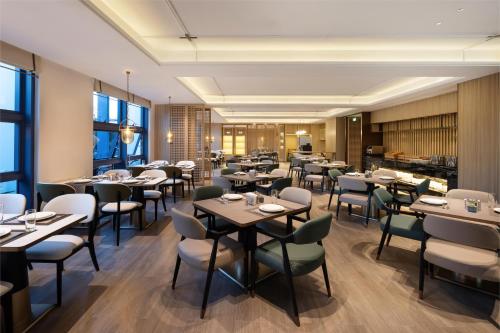 深圳颐朵朵酒店（宝安体育馆店）餐廳或用餐的地方