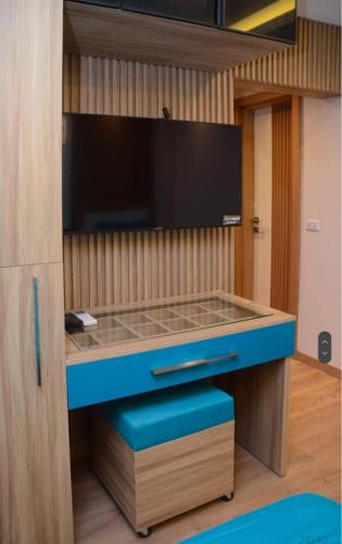 a desk with a glass top in a room at Luxury partial Nile view Maadi Cairo apartment in Cairo