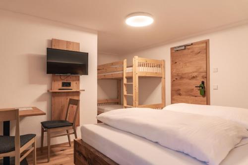 Postel nebo postele na pokoji v ubytování Der Bären in Zell