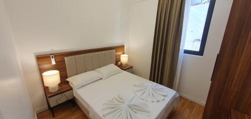 Postel nebo postele na pokoji v ubytování Apartmani Jovanovic - Rafailovici