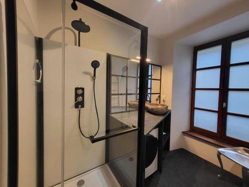 Et badeværelse på Appartement avec terrasse