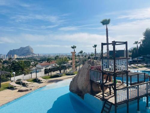 a view of a pool at a resort at Imperial Park - Bungalow mit Panoramablick und schöner Terrasse in Calpe