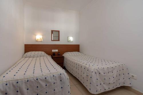 Postel nebo postele na pokoji v ubytování Azahara Playa 34 - One Bed