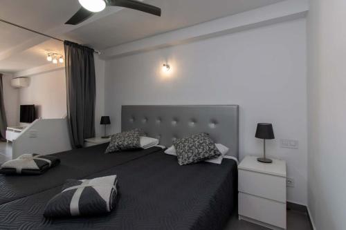 Postel nebo postele na pokoji v ubytování Santa Maria 135 - Studio with air conditioning and pool view