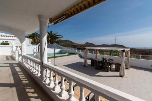 a porch with a gazebo on a house at Villa Melua in Chayofa