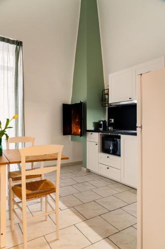 Η κουζίνα ή μικρή κουζίνα στο Andromeda Luxury Flat