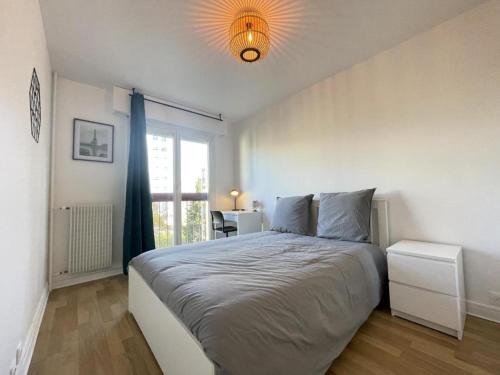 Katil atau katil-katil dalam bilik di Le Bary - 10p - 100m2 - Gare - Parking Privé Gratuit