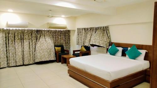 מיטה או מיטות בחדר ב-Hotel signature