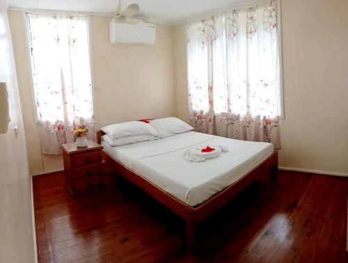 Ένα ή περισσότερα κρεβάτια σε δωμάτιο στο Gizo Lodge