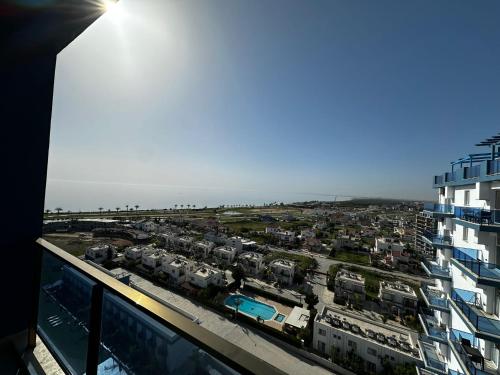 a view of a parking lot from a building at View13 in İskele