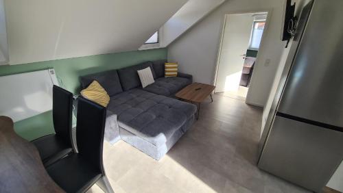 an overhead view of a living room with a couch at Fewo 3 in Deidesheim
