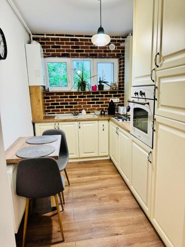 Kuchyň nebo kuchyňský kout v ubytování Blue Apartment