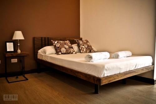 Кровать или кровати в номере Cleon Villas Pension