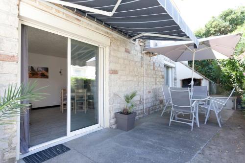 Terrasse ou espace extérieur de l'établissement Appartement 2 chambres, avec terrasse/parking