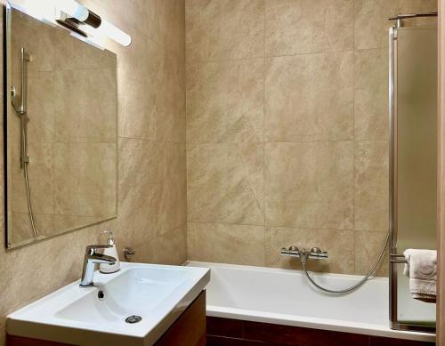 Kúpeľňa v ubytovaní Apartament Caroline Q4Apartments