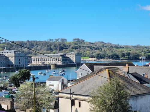 a view of a city with boats in the water at River Views, Free Parking, Near Royal William Yard in Plymouth