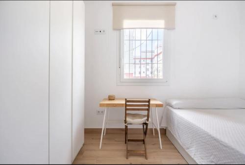 A bed or beds in a room at Acogedor y precioso apartamento en Sevilla