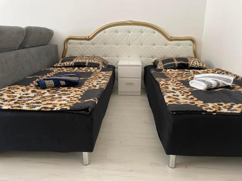 Una cama o camas en una habitación de Luxury apartmán v centru Ostravy