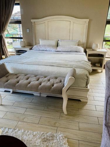 Ένα ή περισσότερα κρεβάτια σε δωμάτιο στο Riverside Boutique Mbombela