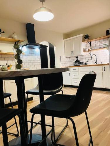 a kitchen with a table and chairs in it at 1BR 1 BA near Carl Health and OSF in Pekin