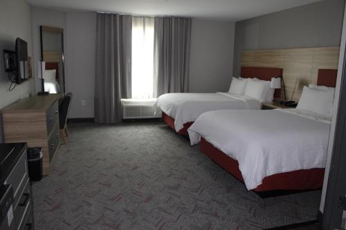 Кровать или кровати в номере Candlewood Suites - Nashville South by IHG